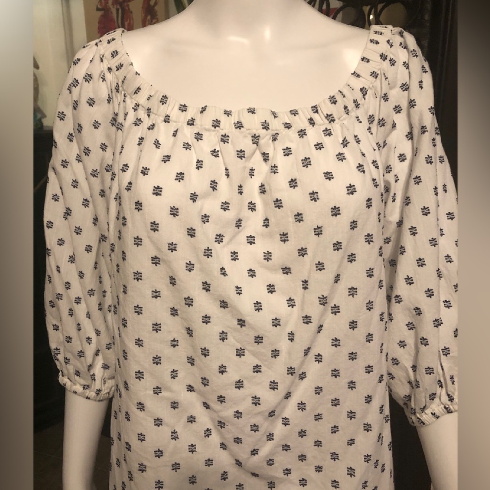 Elegant White Blouse with Blue Floral Design